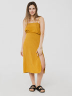 Camisole ample et confortable avec fines bretelles dorée. Designer québécois.