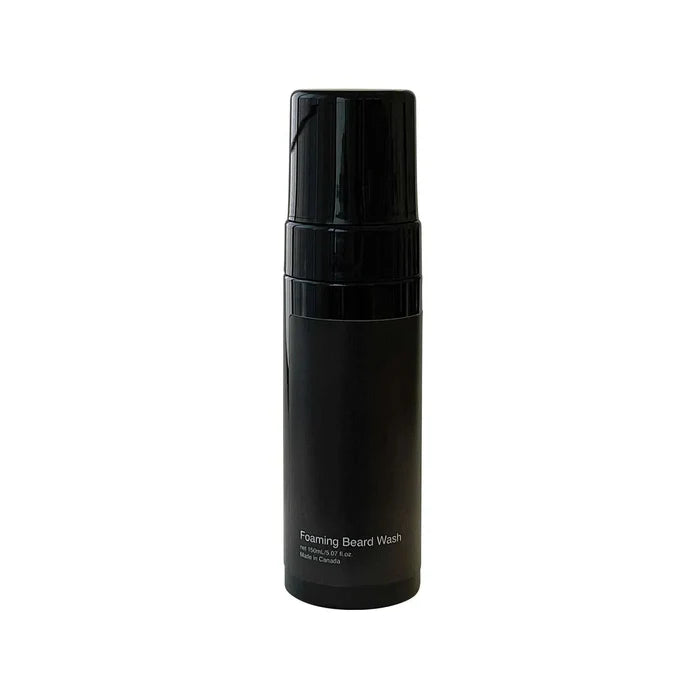 Foaming Beard Wash in a matte black plastic bottle with a black pump dispenser and small white label text.