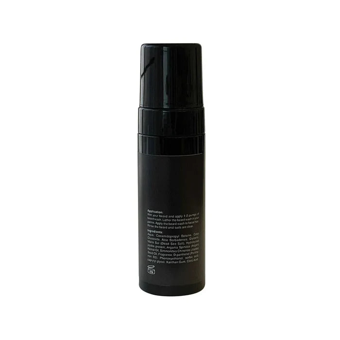 Foaming Beard Wash in a black cylindrical pump bottle with a ribbed dispenser and small white label text