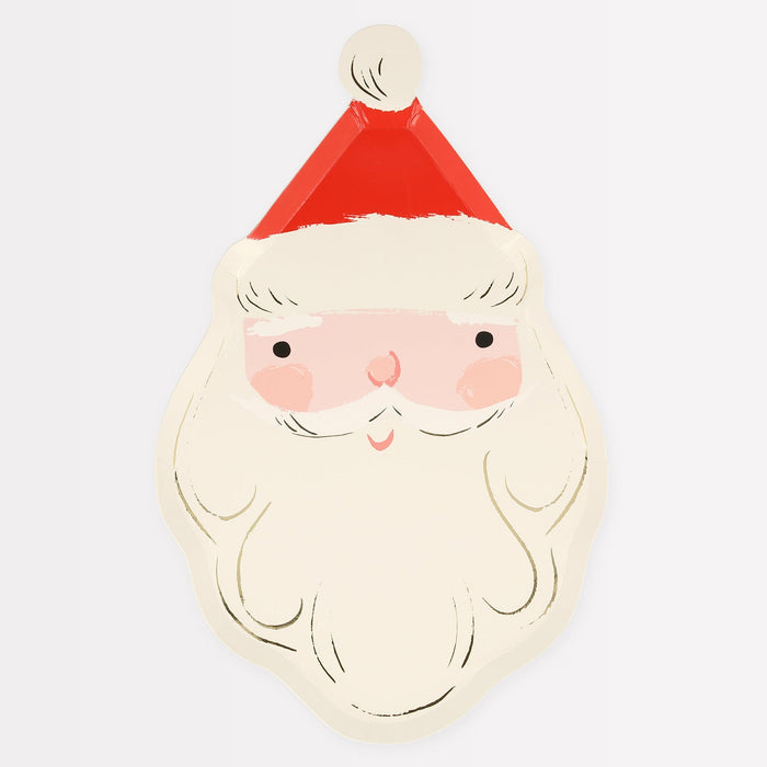 A round paper plate with a illustration of Santa Claus in red and gold colors.