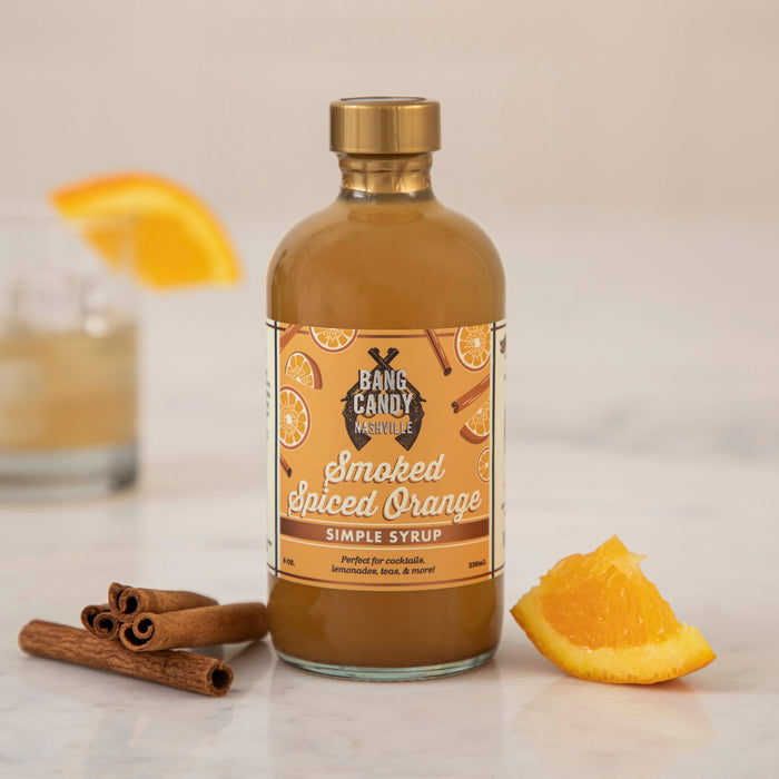 A bottle of Hester & Cook's Spiced Smoked Orange Syrup.