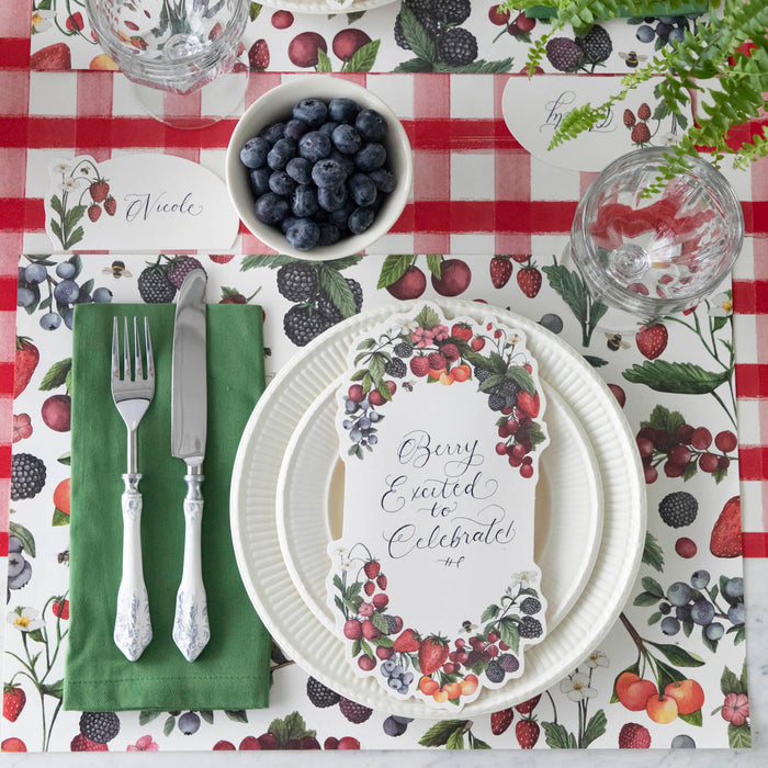 The Wild Berry Placemat under an elegant summertime table setting, from above.